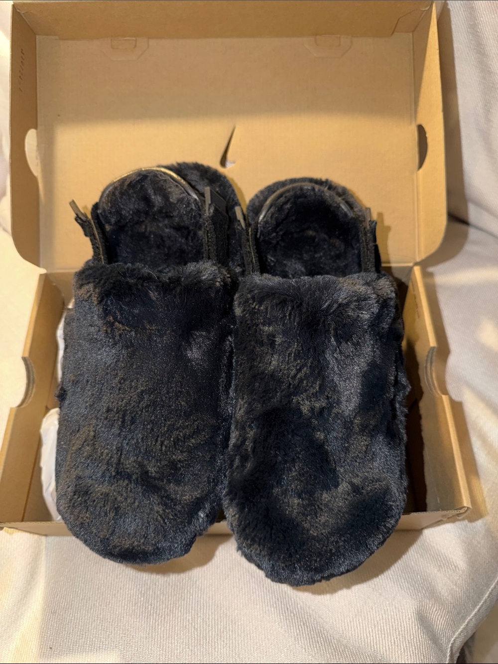 NIKE FUR SLIDES